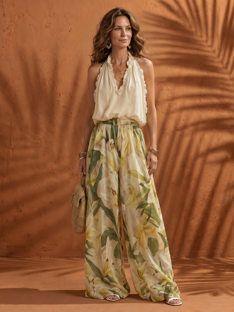 Solange | Completo con Blusa Halter e Pantaloni Floreali a Gamba Larga