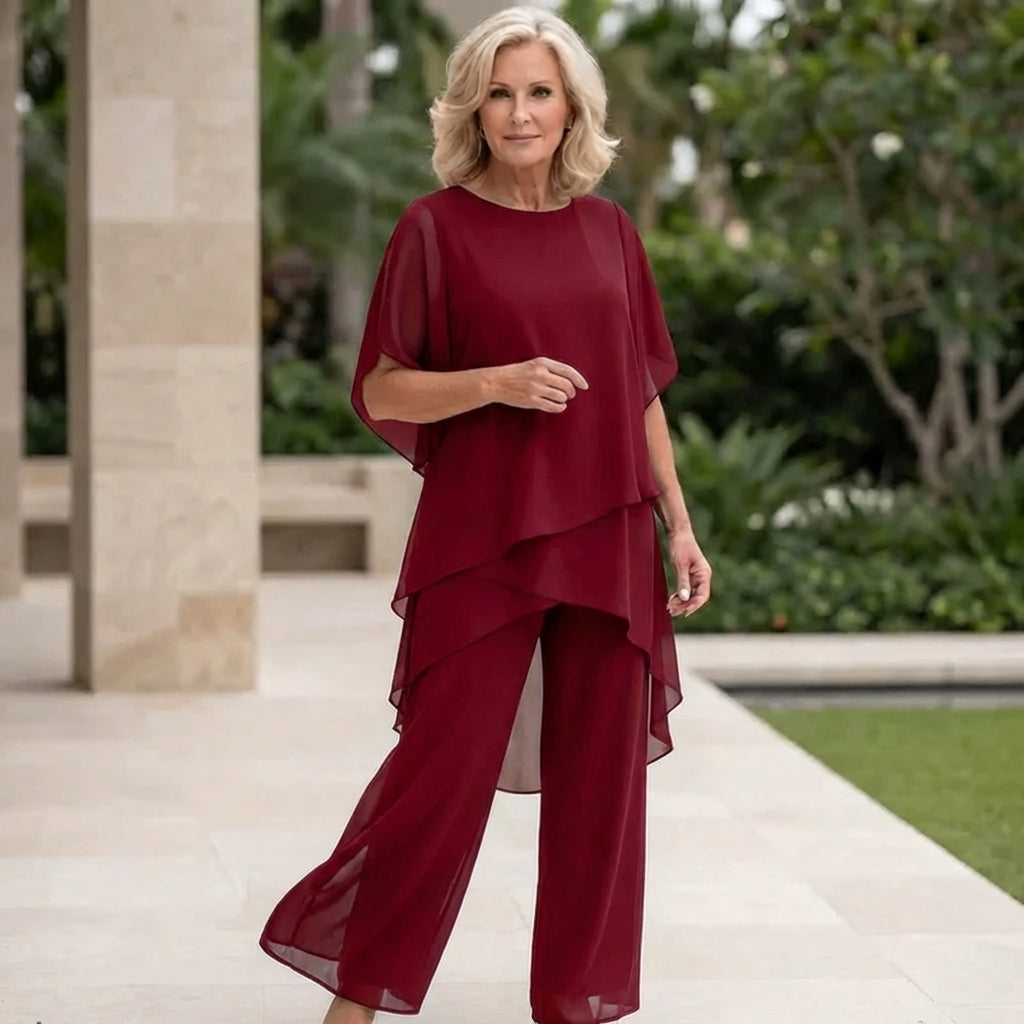 Completo con pantaloni palazzo drappeggiati