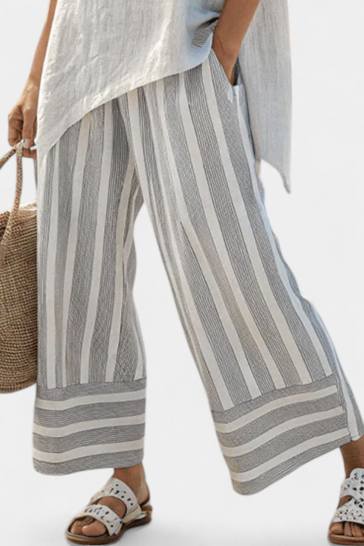 Talvora | camicetta asimmetrica e pantaloni a righe