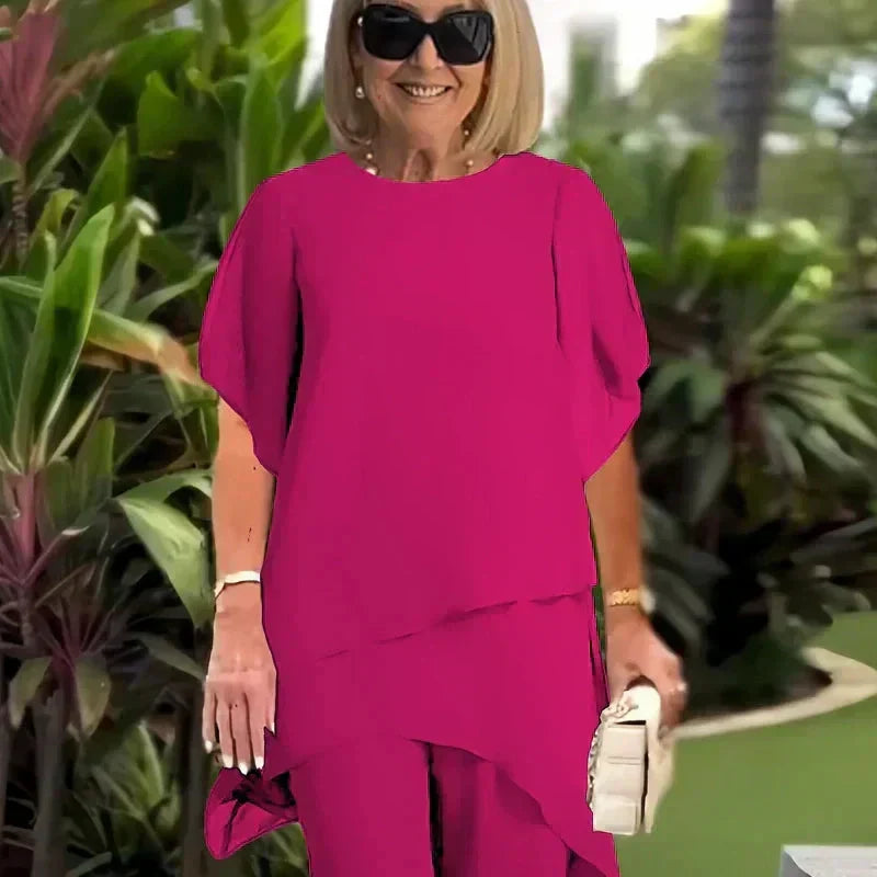 Completo con pantaloni palazzo drappeggiati