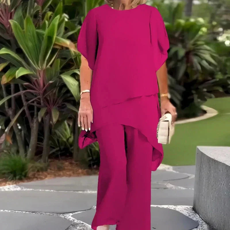 Completo con pantaloni palazzo drappeggiati